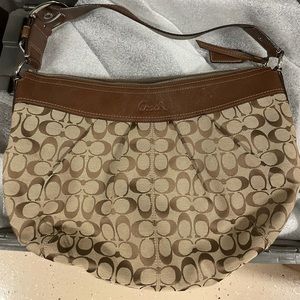 Brown and tan Coach shoulder bag in great condition.